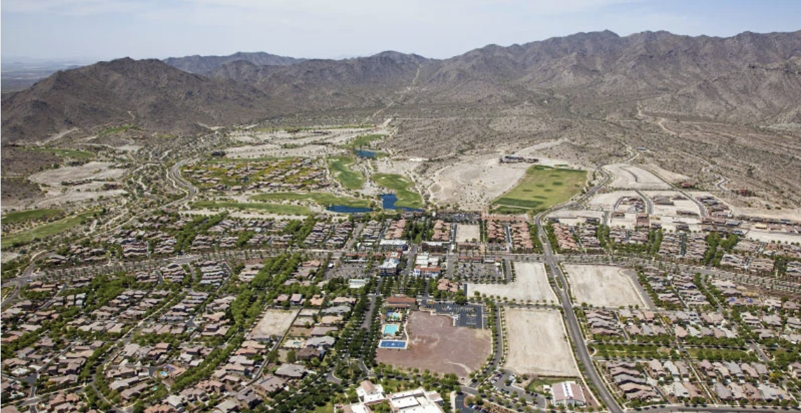 Is Buckeye AZ a good place to buy a home? Buckeye AZ neighborhood showing new homes and desert landscape