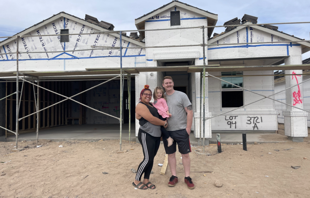 military family building a home with the VA Loan in new construction development areas west of Loop 303 and south of I-10 near Luke Air Force Base Arizona